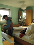 SX17192 Jenni DIYing putting up coving in bedroom.jpg